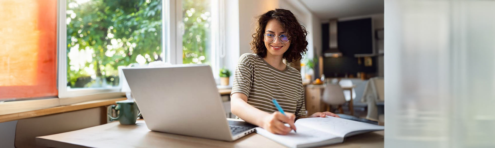 Woman doing banking on laptop